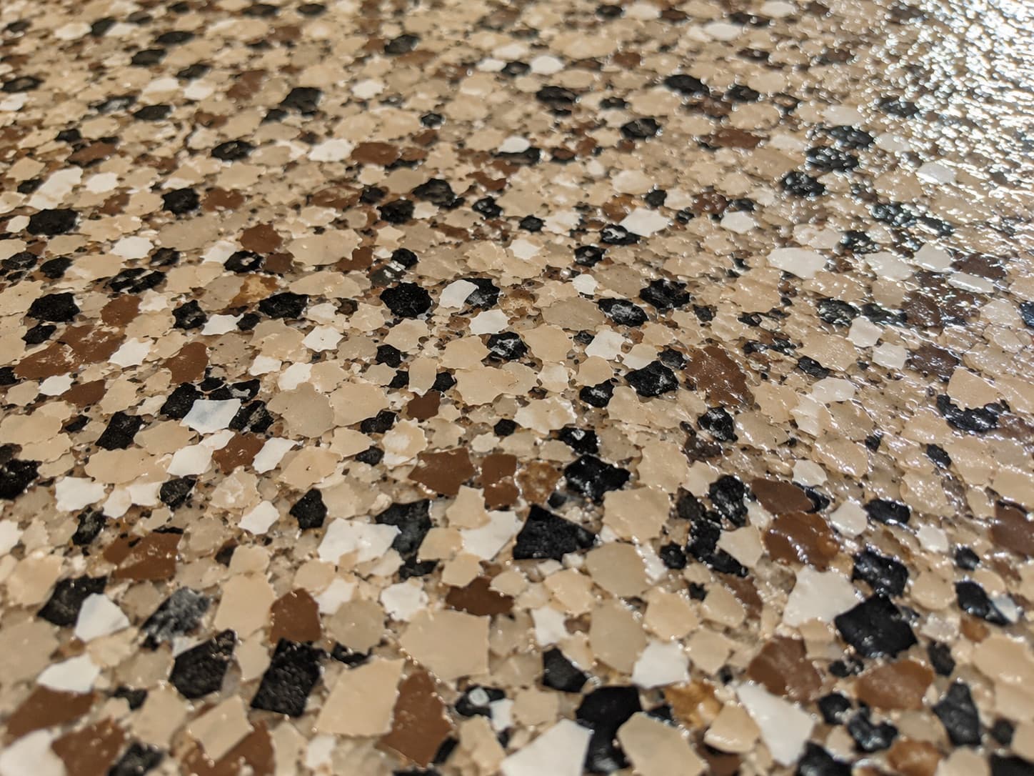Close-up of a flake-finish floor surface